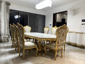 8 Seater Luxury Teak Wood Carved Dining Table –  Gold Italian Finish | Handcrafted Royal Dining Set for Elegant Interiors choice